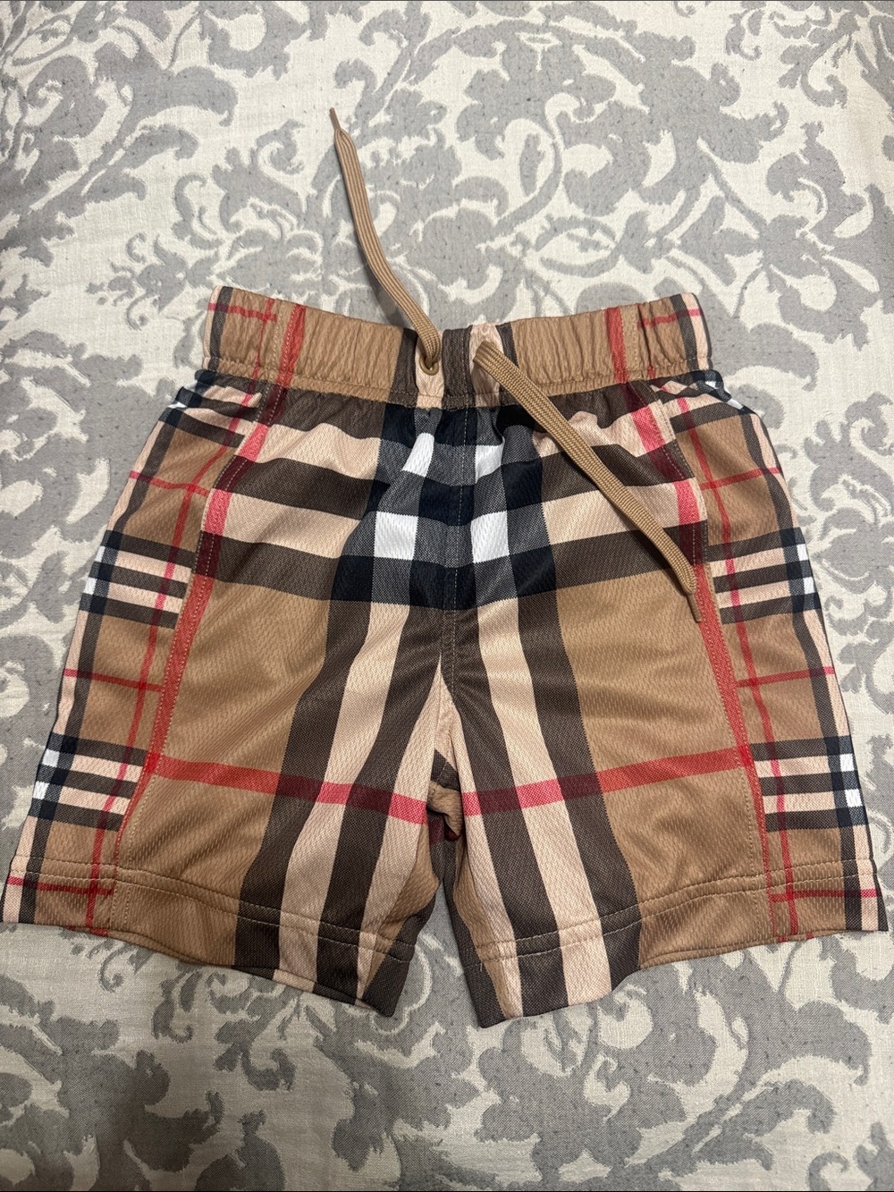 Burberry Tan Plaid Kids Shorts with Red and Black Accents